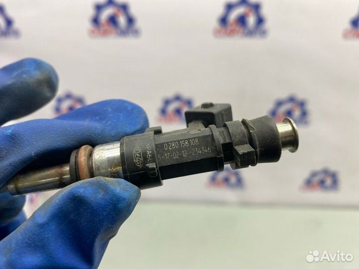 Форсунка инжекторная электрическая Opel Astra J