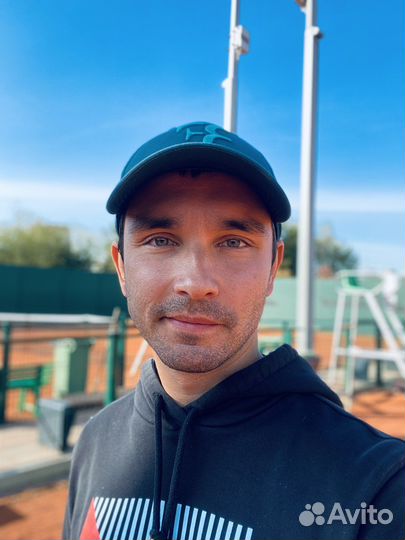 Тренер по большому теннису