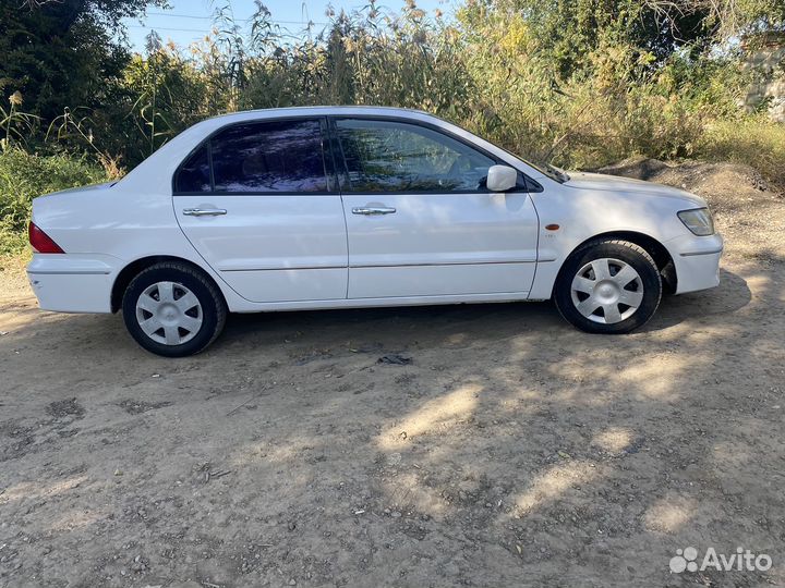 Mitsubishi Lancer Cedia 1.5 CVT, 2001, 100 000 км