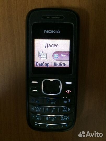 Телефон Nokia с адаптером