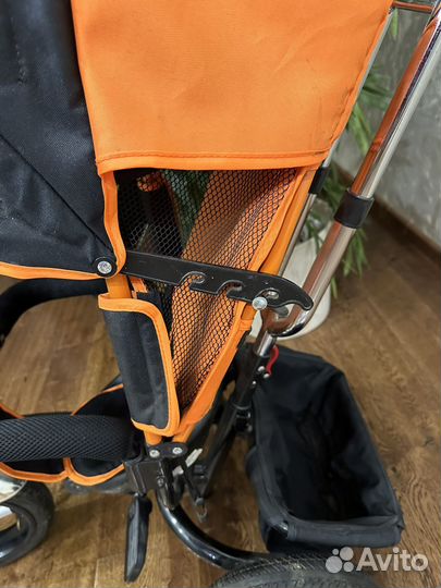 Трехколесный велосипед с ручкой