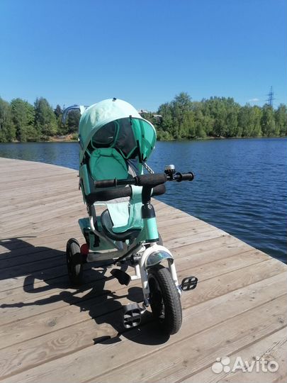 Коляска трёх колёсная