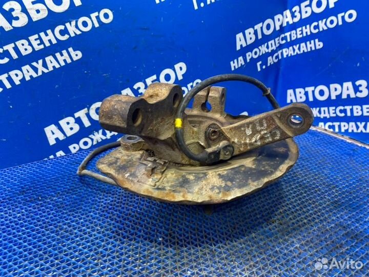 Передний левый поворотный кулак Mitsubishi Lancer