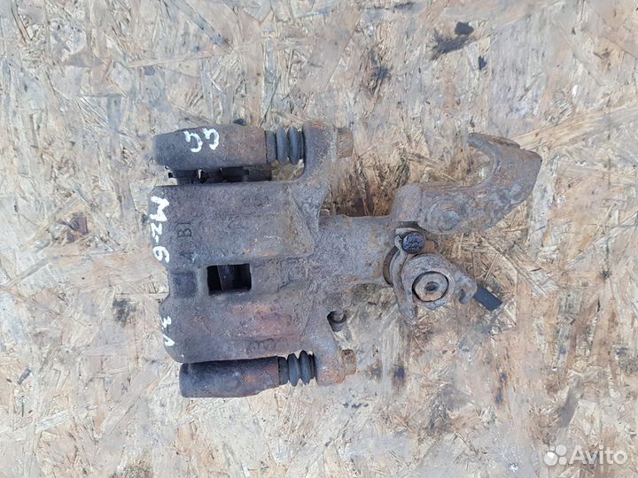 Суппорт тормозной задний правый Мазда 6 GG