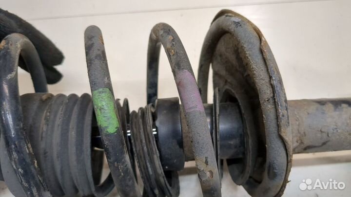 Амортизатор подвески Nissan Almera N16, 2004