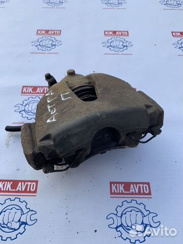 Суппорт тормозной передний правый левый Opel Astra