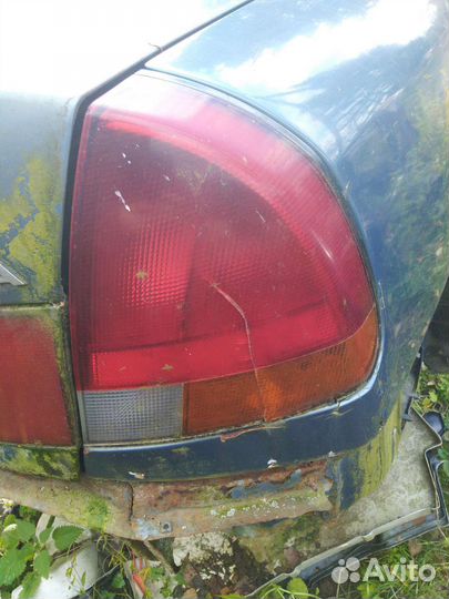 Задние фонари Митсубиси Каризма