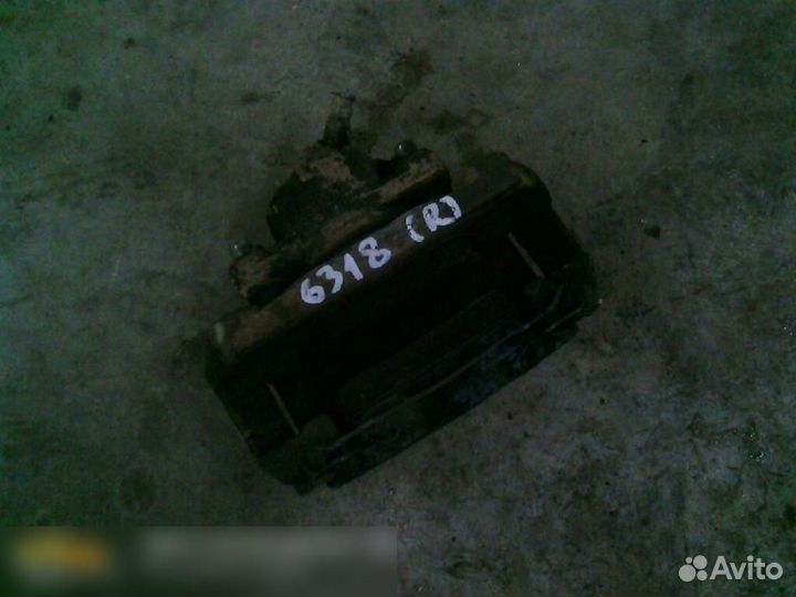 Суппорт передний правый Renault Duster 2012