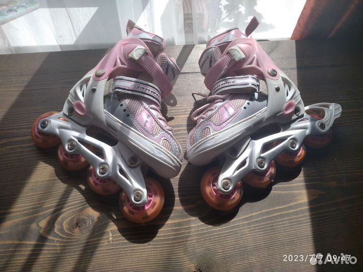 Роликовые коньки