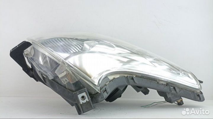 Фара левая Toyota Ractis NCP100