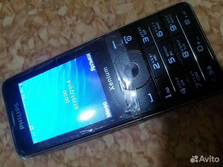 Телефон Philips X1560