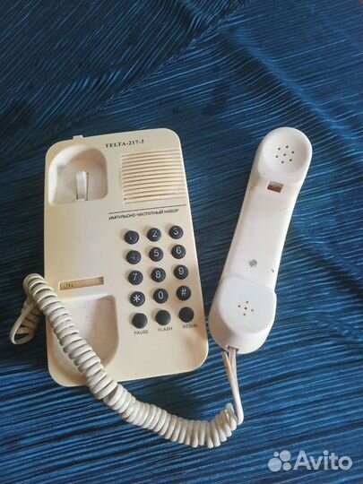 Телефон кнопочный