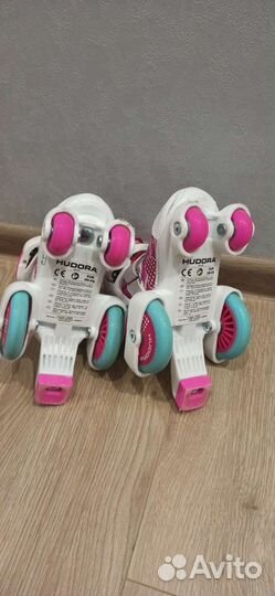 Роликовые коньки