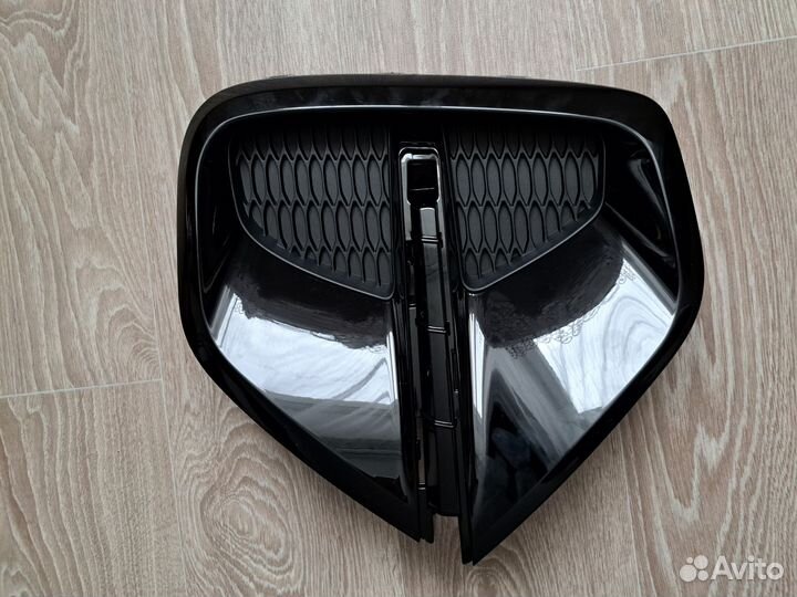 Заглушка бампера передняя левая