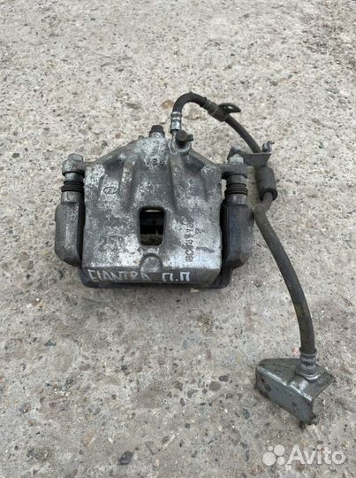 Суппорт тормозной передний правый Hyundai Elantra