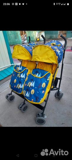 Коляска для двоини