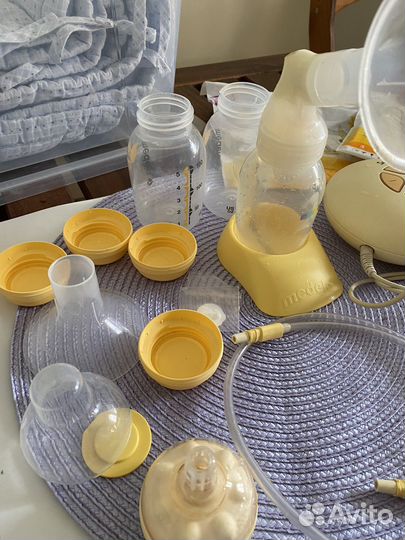 Молокоотсос medela электрический