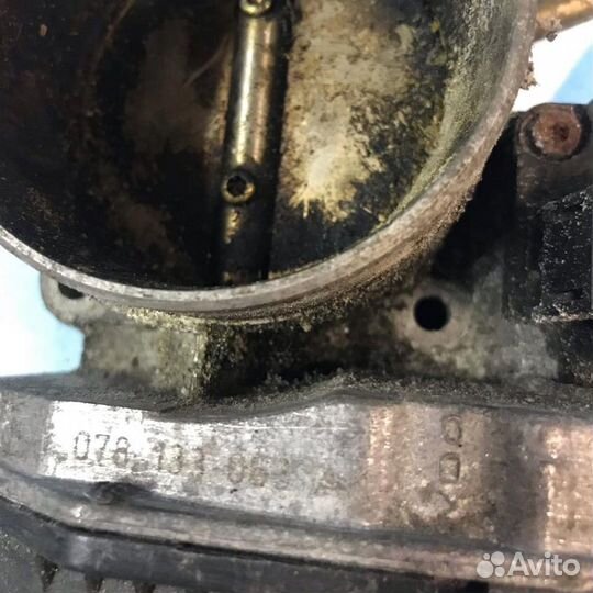 Дроссельная заслонка 078133063AK