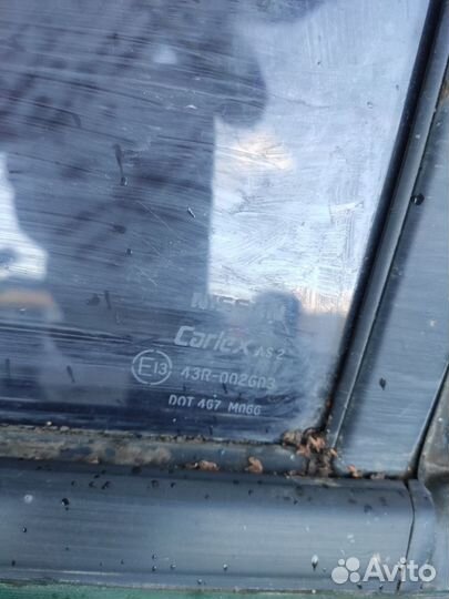 Стекло дверное заднее левое Nissan Almera N15