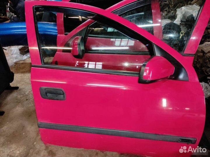 Двери передние Opel Astra G