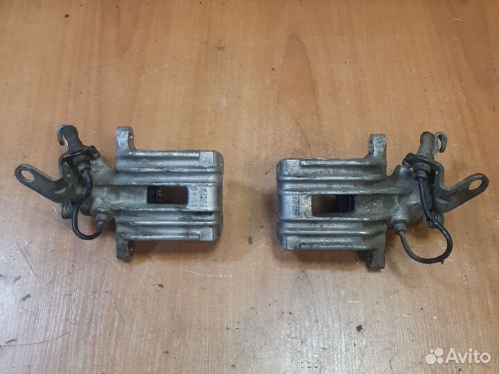 Суппорт задний VAG Volkswagen Джетта 5 Audi A3 8P