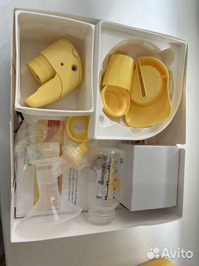 Молокоотсос medela электрический
