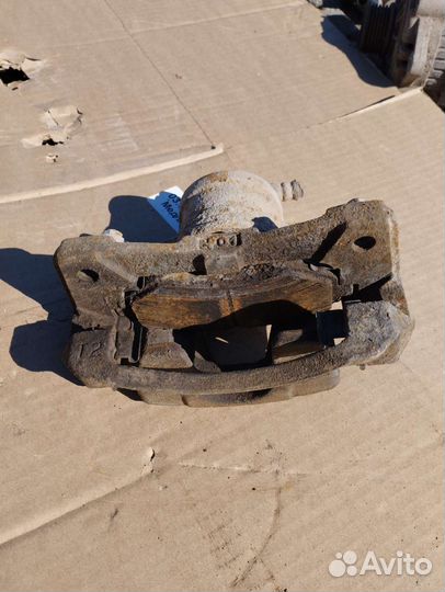 Суппорт передний правый Chevrolet Aveo T200