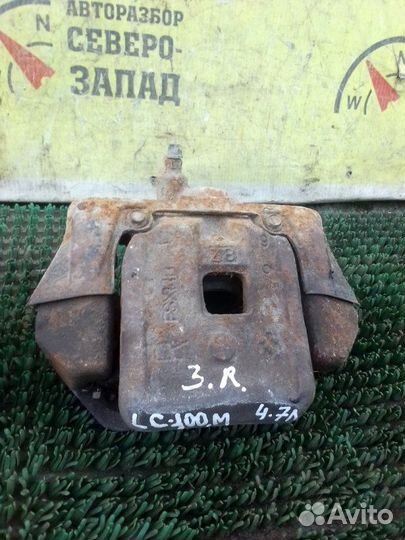 Суппорт тормозной задний правый Toyota Land