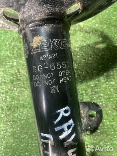 Стойка в сборе левая передняя Toyota rav4