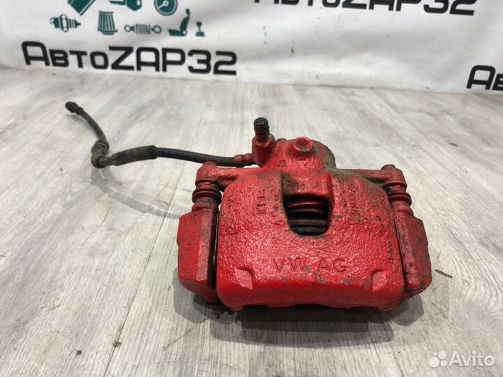 Суппорт тормозной передний правый Volkswagen Polo