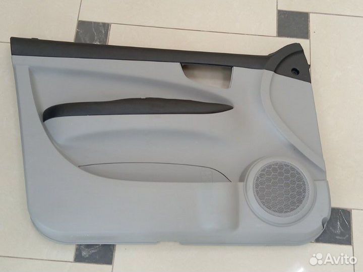 Обшивка двери передняя левая Тагаз Вега C100 2009