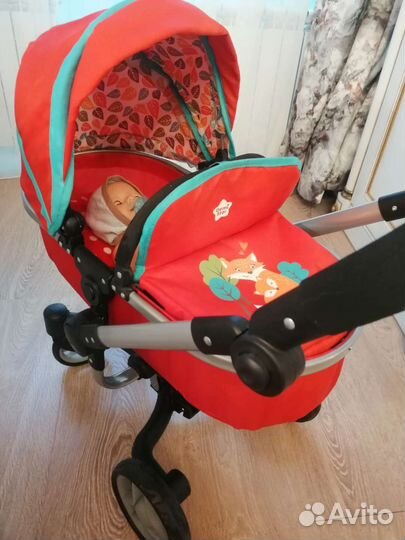 Игрушечная коляска