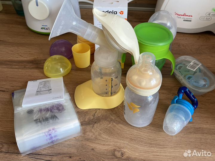 Молокоотсос ручной medela с доп набором