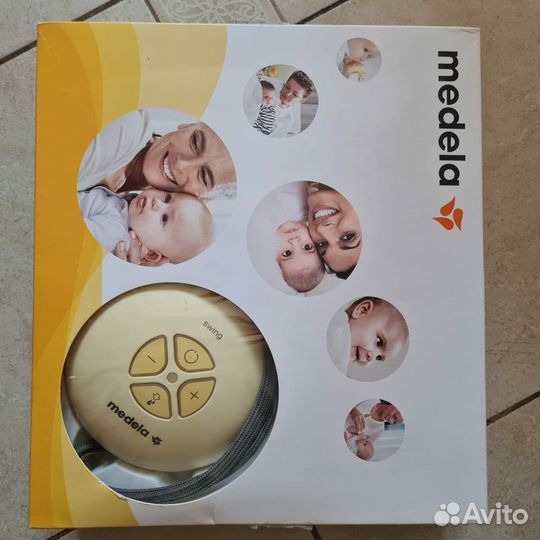 Молокоотсос medela электрический