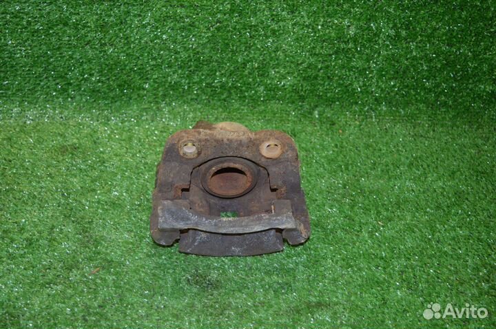 Суппорт передний левый Renault Logan