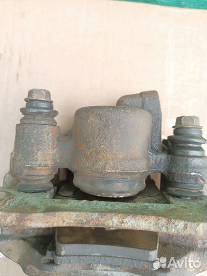 Суппорт тормозной зад левый Pajero Sport 2008-2015