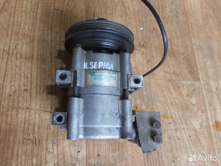 Компрессор системы кондиционирования Kia Sephia 1
