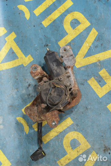 Моторчик левой фары mazda 323 F (BG)