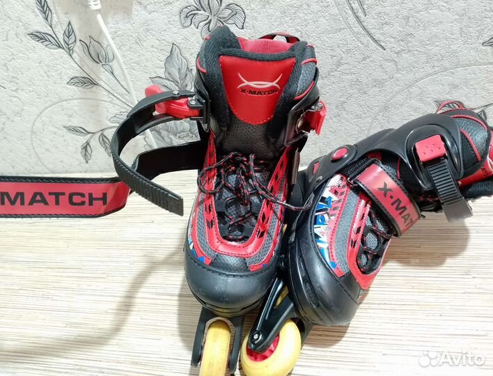 Роликовые коньки