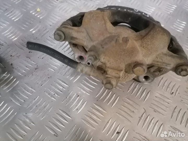 Суппорт передний Chevrolet Cruze 1.6