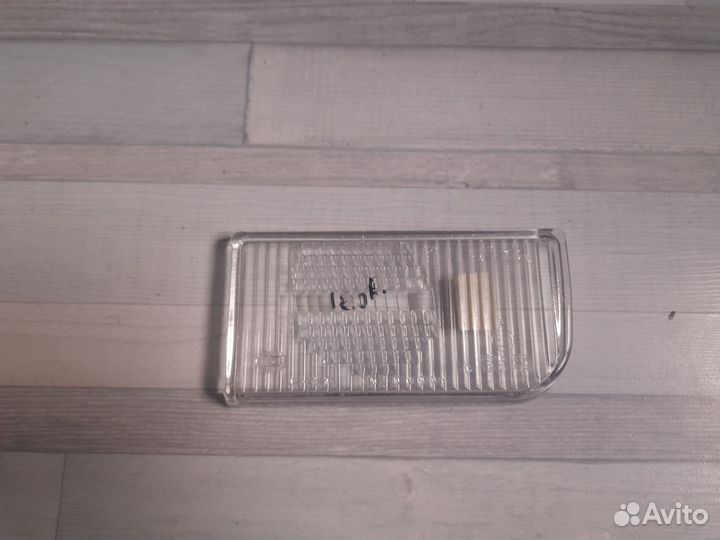 Стекло фары противотуманной левой BMW 7-E32