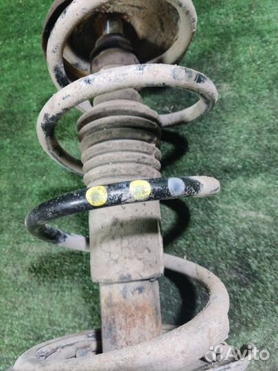 Стойка передняя правая Nissan Almera G15