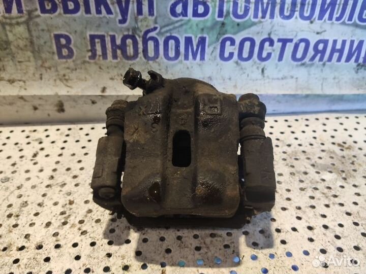 Суппорт тормозной передний правый Suzuki Grand Vit