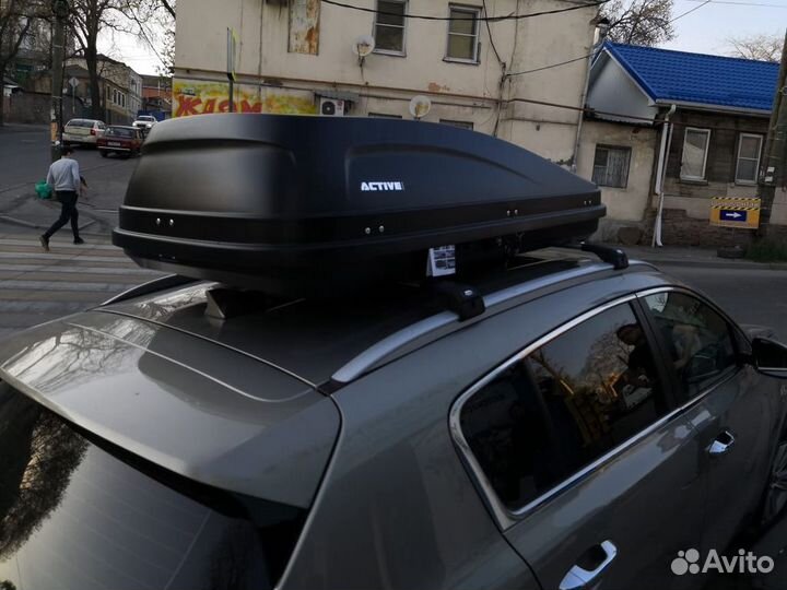 Бокс на крышу 2-х сторонний 450л на Sportage