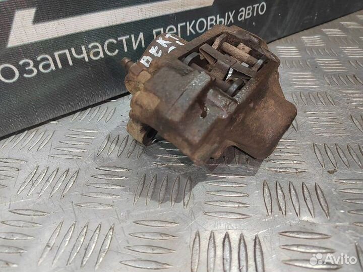 Суппорт тормозной задний левый Opel Vectra B