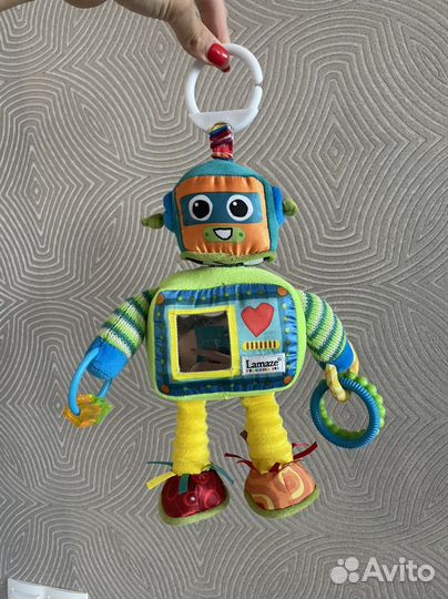 Развивающий коврик игрушка Lamaze fisher price