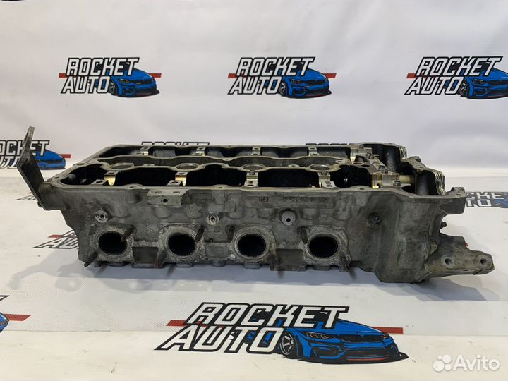 Головка блока левая BMW 750i 11127573937
