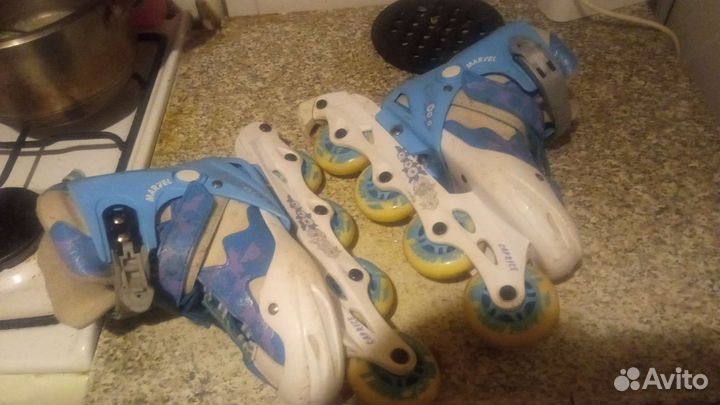 Роликовые коньки