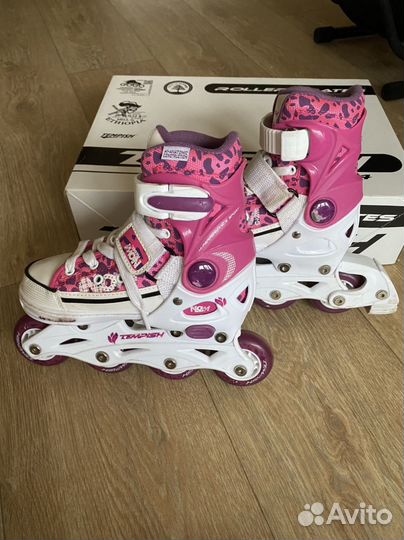 Роликовые коньки