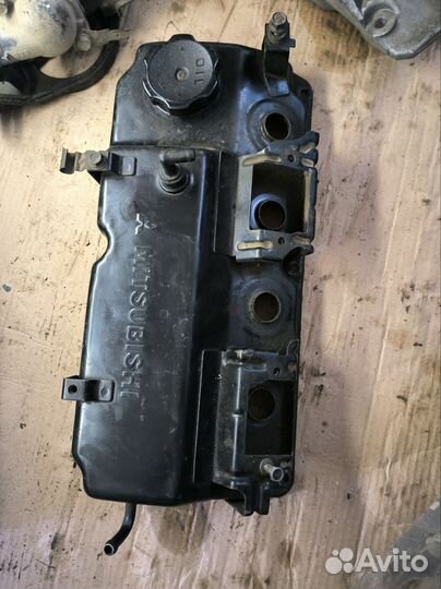 Клап. крышка, кронштейн гура lancer 9 1.6